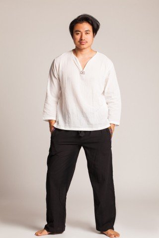 Pantaloni negri cu motive etnice multicolore pe buzunare si elastic la glezna