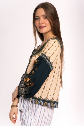 Bluza crem cu print floral si coada de paun