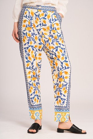 Pantaloni crem cu print galben albastru