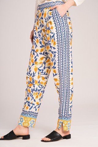 Pantaloni crem cu print galben albastru