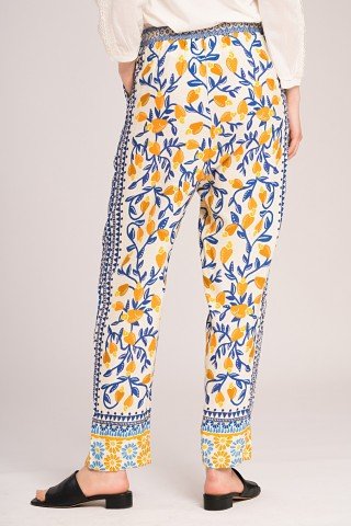 Pantaloni crem cu print galben albastru