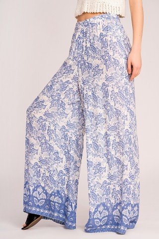 Pantaloni largi albi cu imprimeu bleu