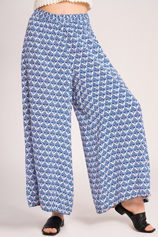 Pantaloni lungi largi albi cu print albastru